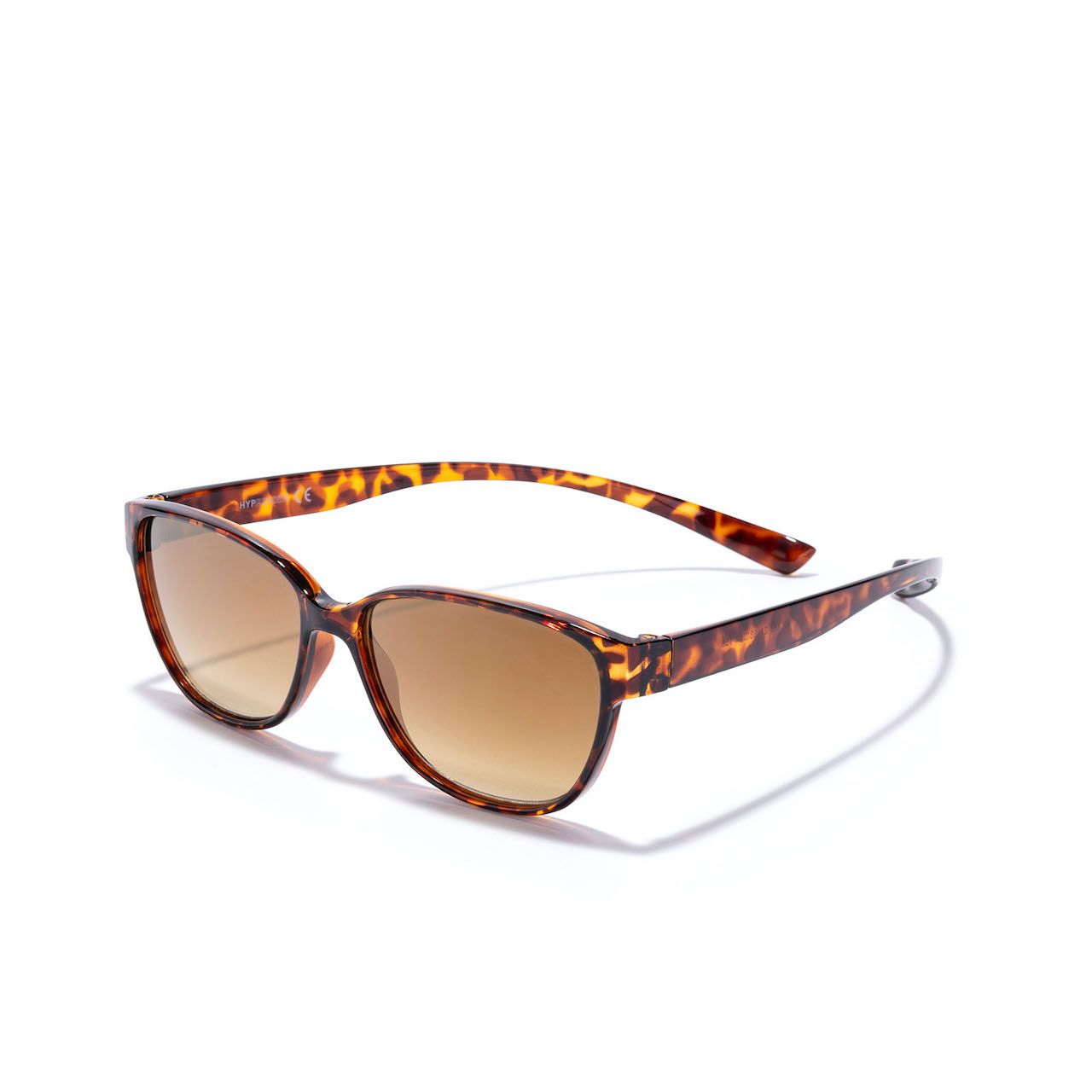 Sonnenbrille mit braunen Gläsern und Schildpatt-Muster-Rahmen. Seitliche Ansicht, auf weißem Hintergrund.