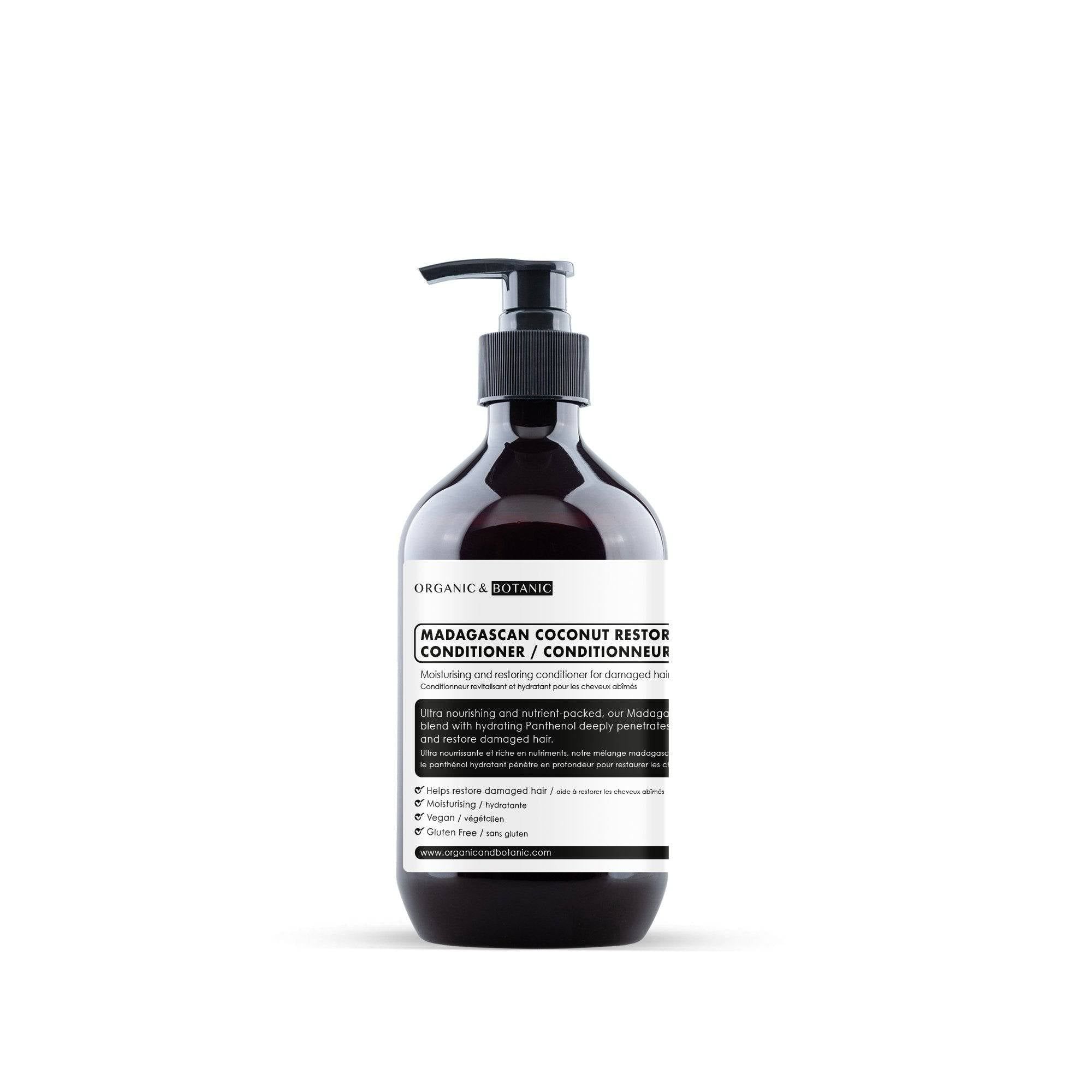 Braune Flasche mit schwarzem Pumpverschluss. Etikett mit Text: MADAGASCAN COCONUT RESTOR CONDITIONER. Marke: Organic & Botanic.