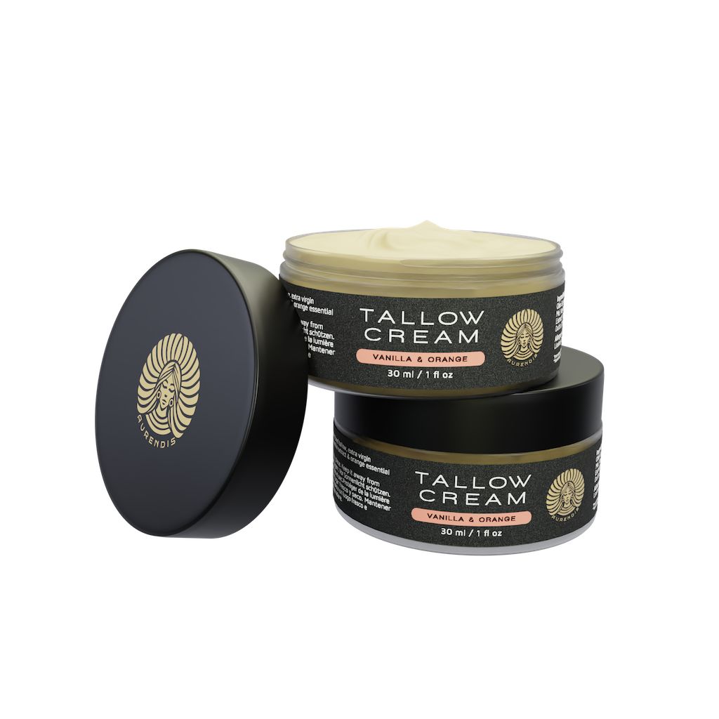 Zwei Tiegel Tallow Creme, 30 ml, Vanilla & Orange. Schwarze Deckel, goldfarbenes Logo.