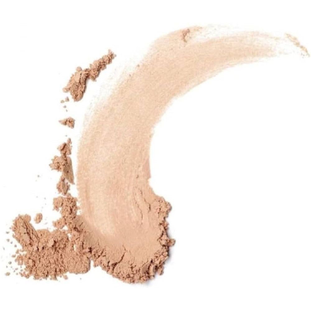 Heller Puder-Abstrich. Helle, beige Farbe. Einige Puderpartikel daneben.