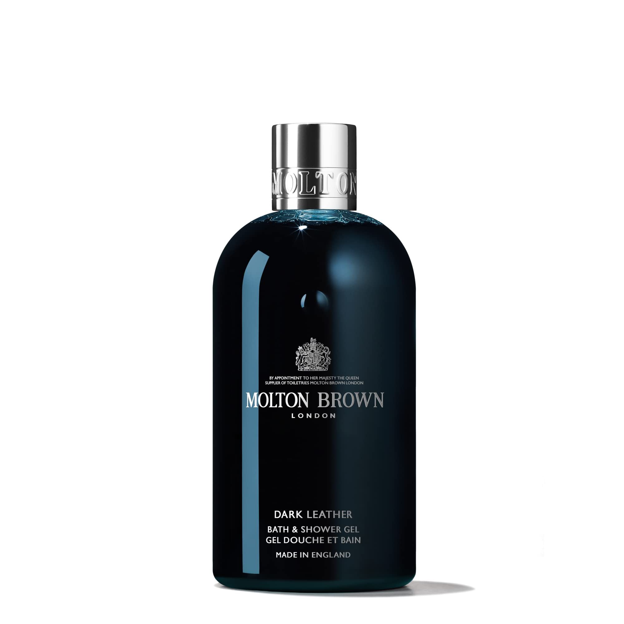 Dunkelblaue Flasche mit silbernem Deckel. Aufschrift: Molton Brown London, Dark Leather Bath & Shower Gel, Made in England.
