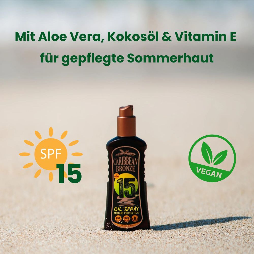 Braune Flasche. Aufschrift: Caribbean Bronze, 15 SPF, Oil Spray, Medium Protection. Vegan-Siegel. Text: Mit Aloe Vera, Kokosöl & Vitamin E.