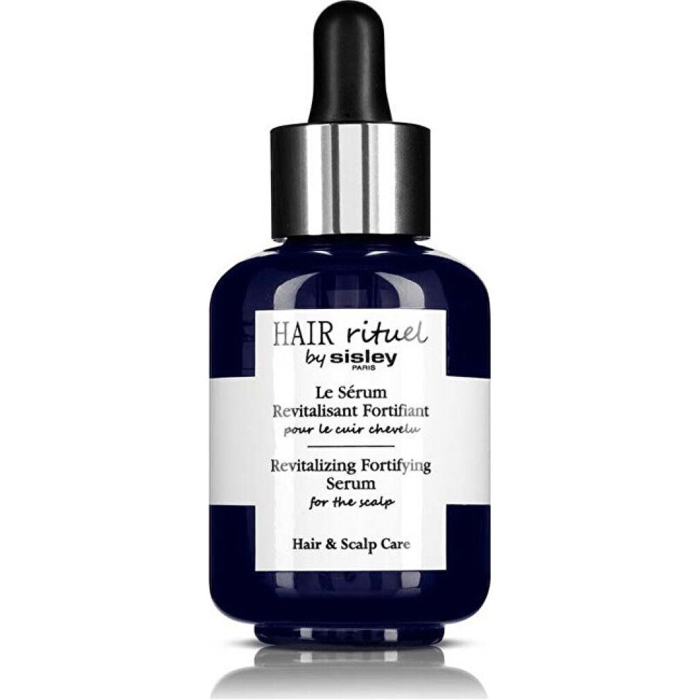 Dunkelblaue Flasche mit schwarzer Pipette. Aufschrift: HAIR rituel by sisley, Le Sérum Revitalisant Fortifiant, Revitalizing Fortifying Serum for the scalp.