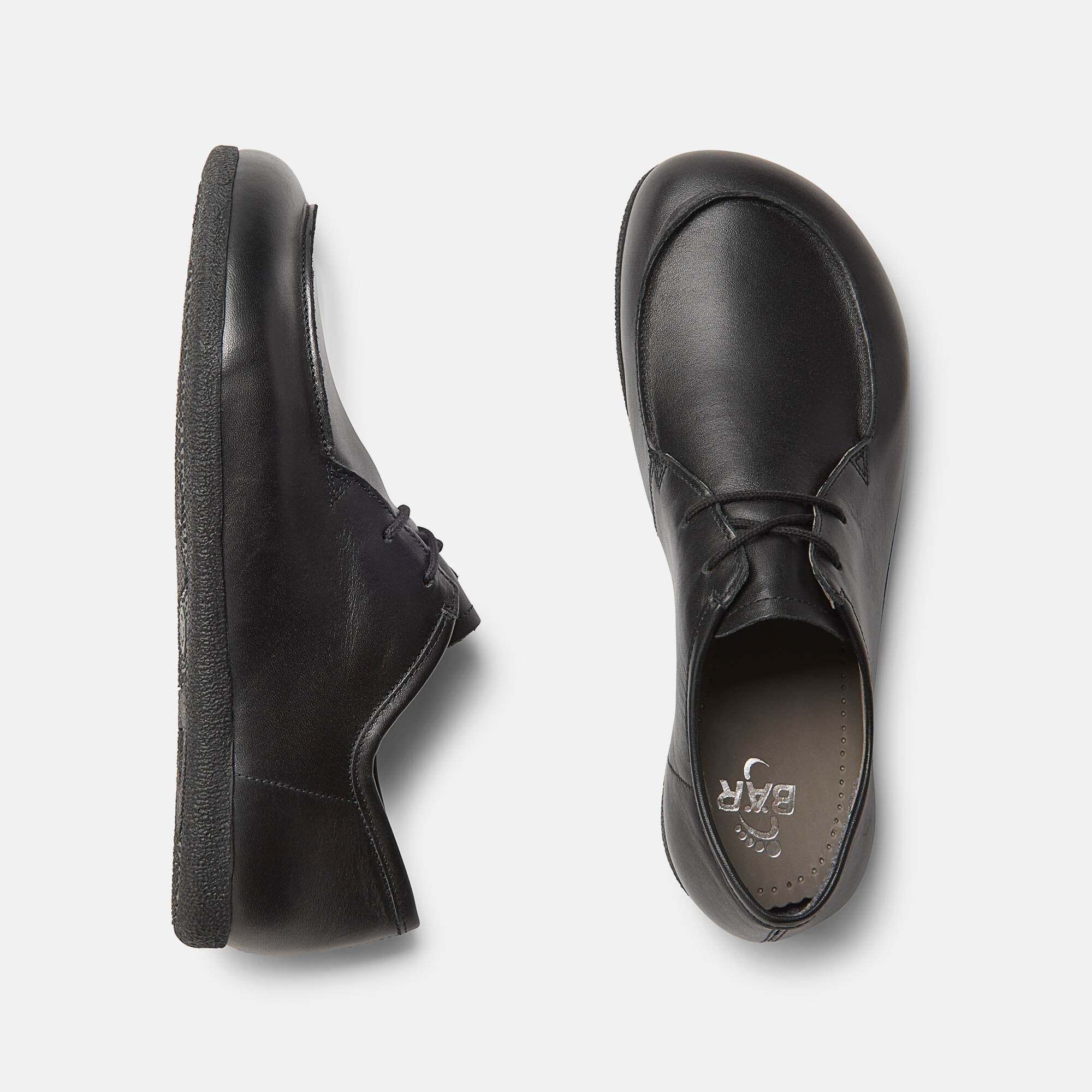 Schwarze Leder-Schnürschuhe für Damen, breite Passform, Draufsicht.