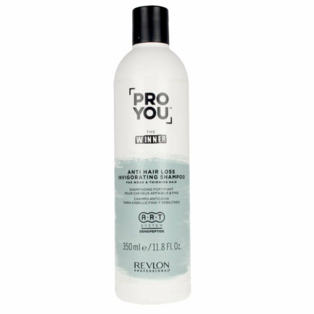 Weiße Flasche mit schwarzem Deckel. Aufschrift: PRO YOU, THE WINNER, Anti-Haarausfall Shampoo. Revlon Professional.