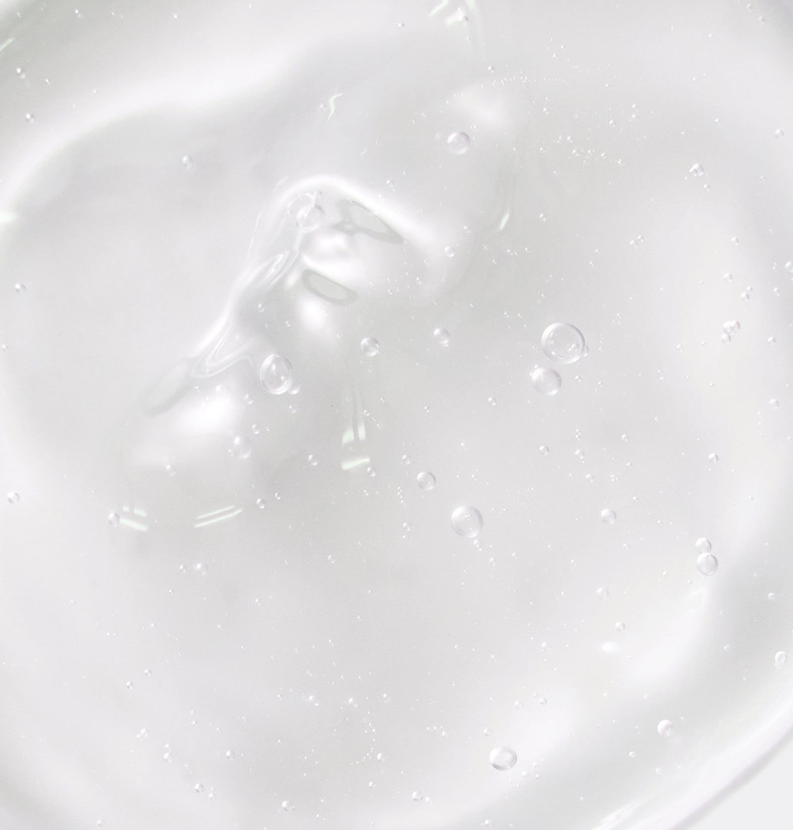 Nahaufnahme von transparentem Gel. Blasen im Gel sichtbar.