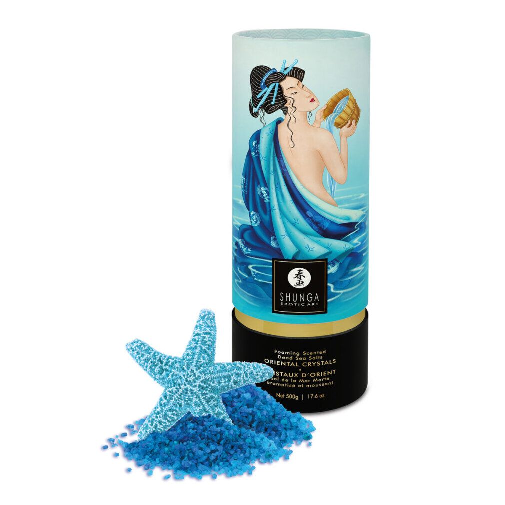 Zylindrische Verpackung, Frau im Wasser, Seestern und blaues Salz. Text: SHUNGA, Oriental Crystals.