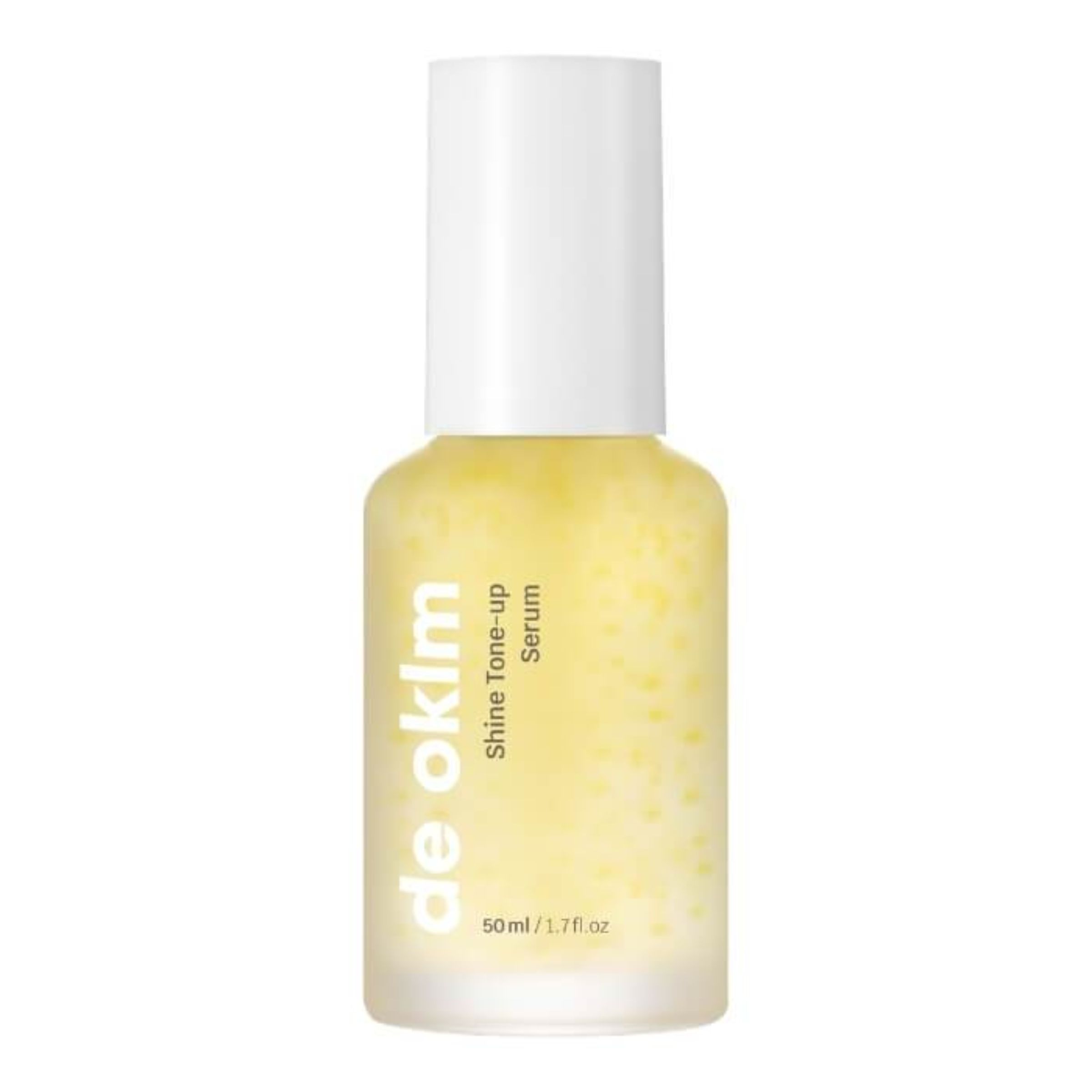 Gelbliche Serumflasche mit weißem Deckel. Aufschrift: de oklm, Shine Tone-up Serum, 50 ml / 1.7 fl oz.