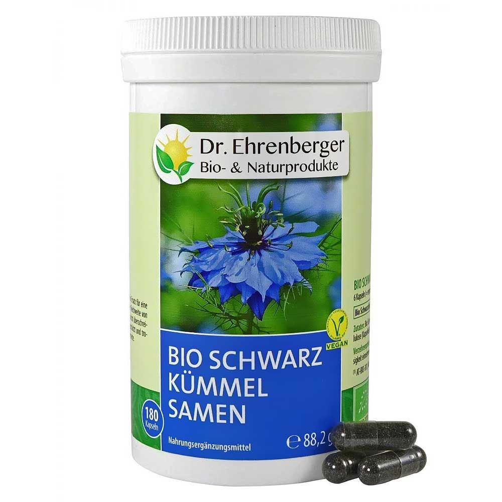 Weißes Behältnis mit Aufschrift "Dr. Ehrenberger Bio Schwarzkümmel Samen". Schwarze Kapseln liegen daneben. Vegan-Siegel.