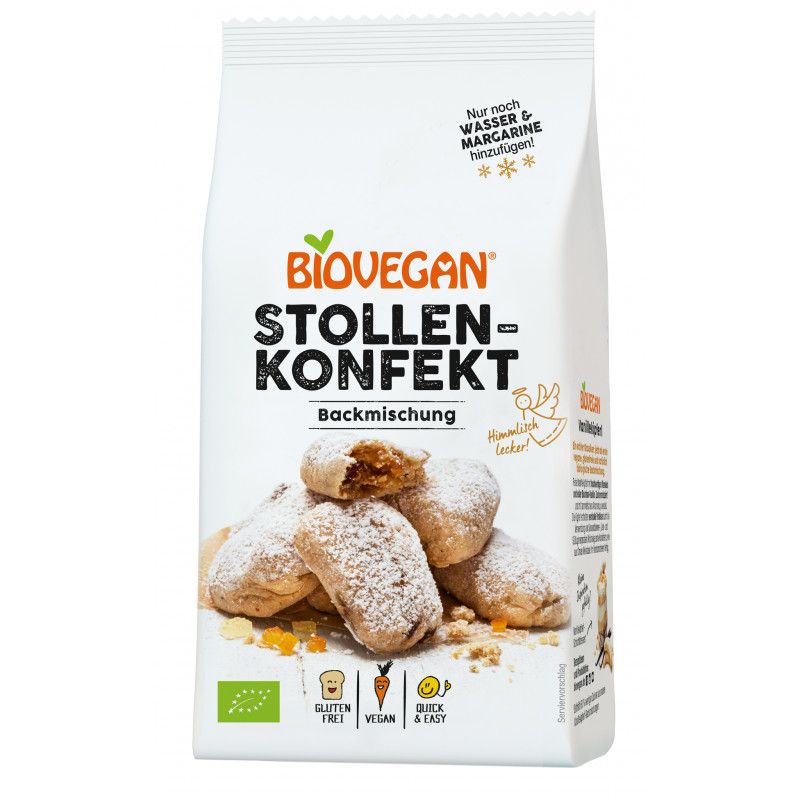 Verpackung mit "Biovegan Stollen-Konfekt Backmischung". Glutenfrei, vegan. Gezeigte Stollenstücke mit Puderzucker.