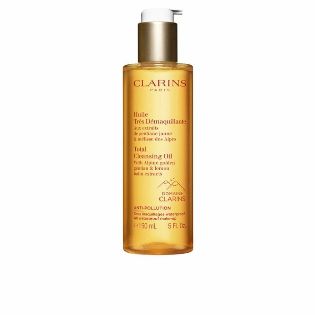 Klare Flasche mit goldfarbenem Inhalt und Dosierpumpe. Beschriftung: Clarins Total Cleansing Oil, 150 ml.