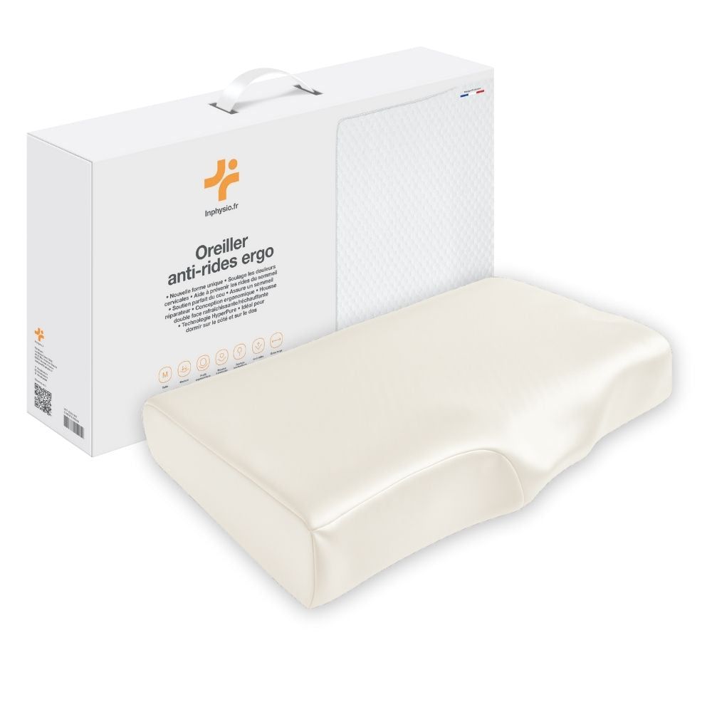 Beige ergonomisches Kissen mit Seidenbezug. In Verpackung mit Griff. Text: Oreiller anti-rides ergo.