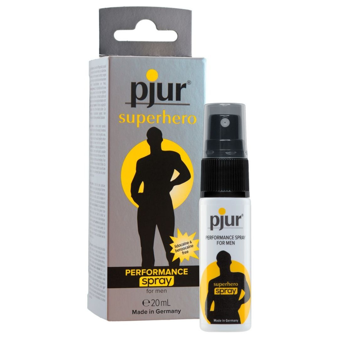 pjur superhero PERFORMANCE SPRAY FOR MEN. Flasche und Verpackung. Gelbes Logo und Silhouette eines Mannes. Made in Germany. 20ml.