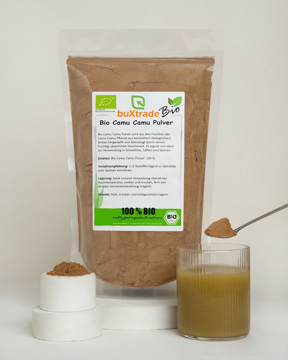 Buxtrade Bio Camu Camu Pulver in einem Standbodenbeutel mit Bio-Siegel und Hinweisen zur Lagerung und Anwendung.