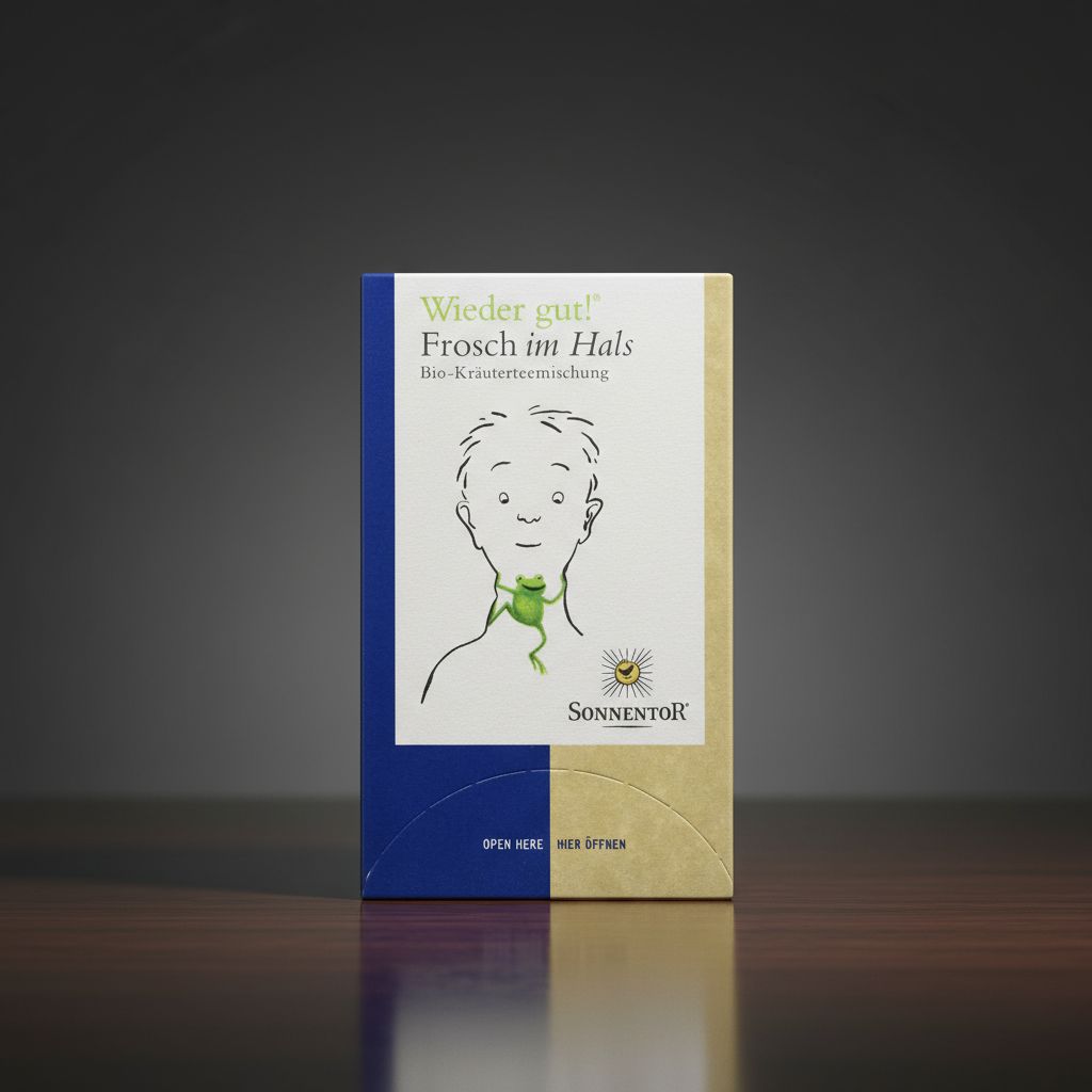 SonnentoR® Frosch im Hals® Tee-Verpackung auf einem Holztisch.