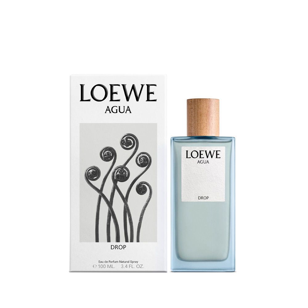 Loewe Agua Drop Eau de Parfum Flakon und Karton. Hellblaue Flüssigkeit, Holzverschluss.