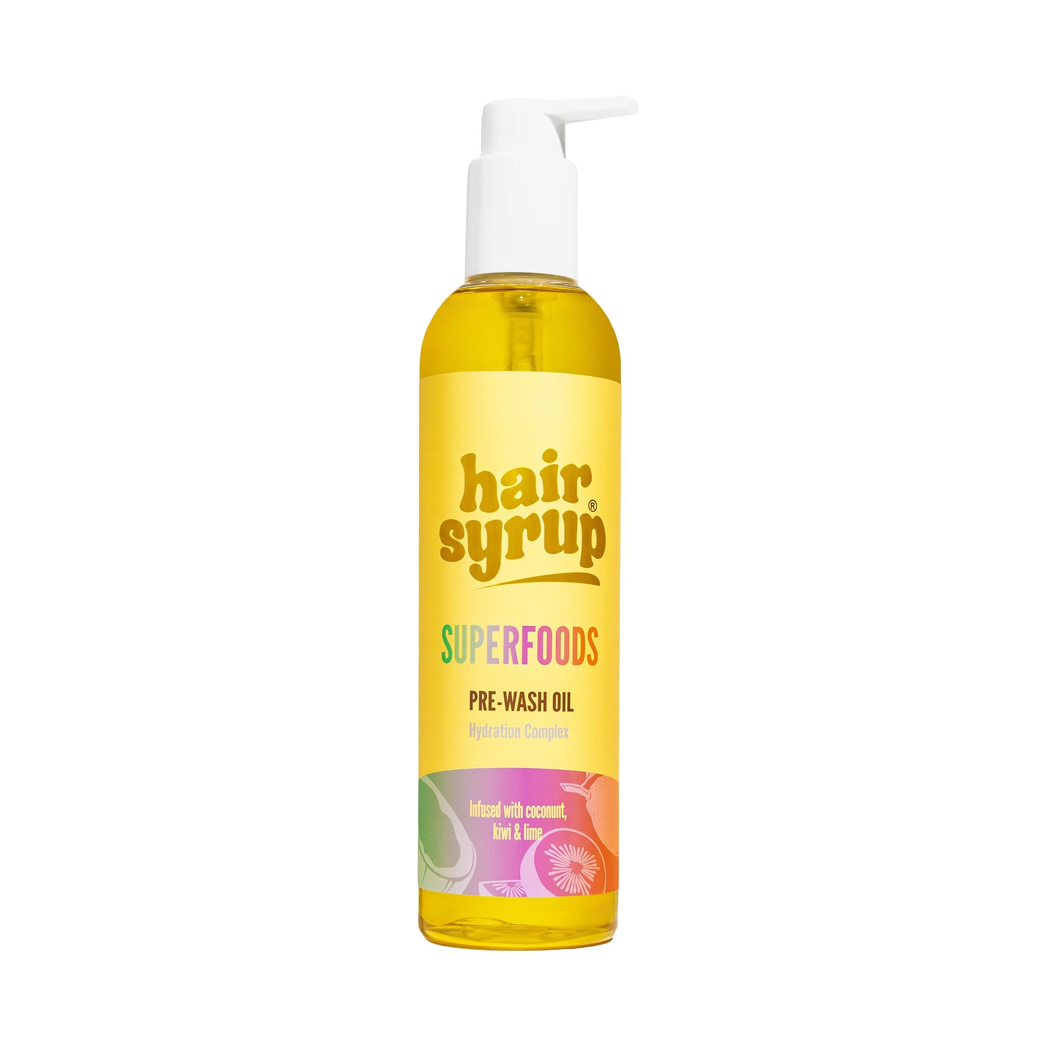 Gelbe Flasche mit Pumpe. Aufschrift: Hair Syrup Superfoods Pre-Wash Oil. Mit Kokosnuss, Limette & Ingwer.