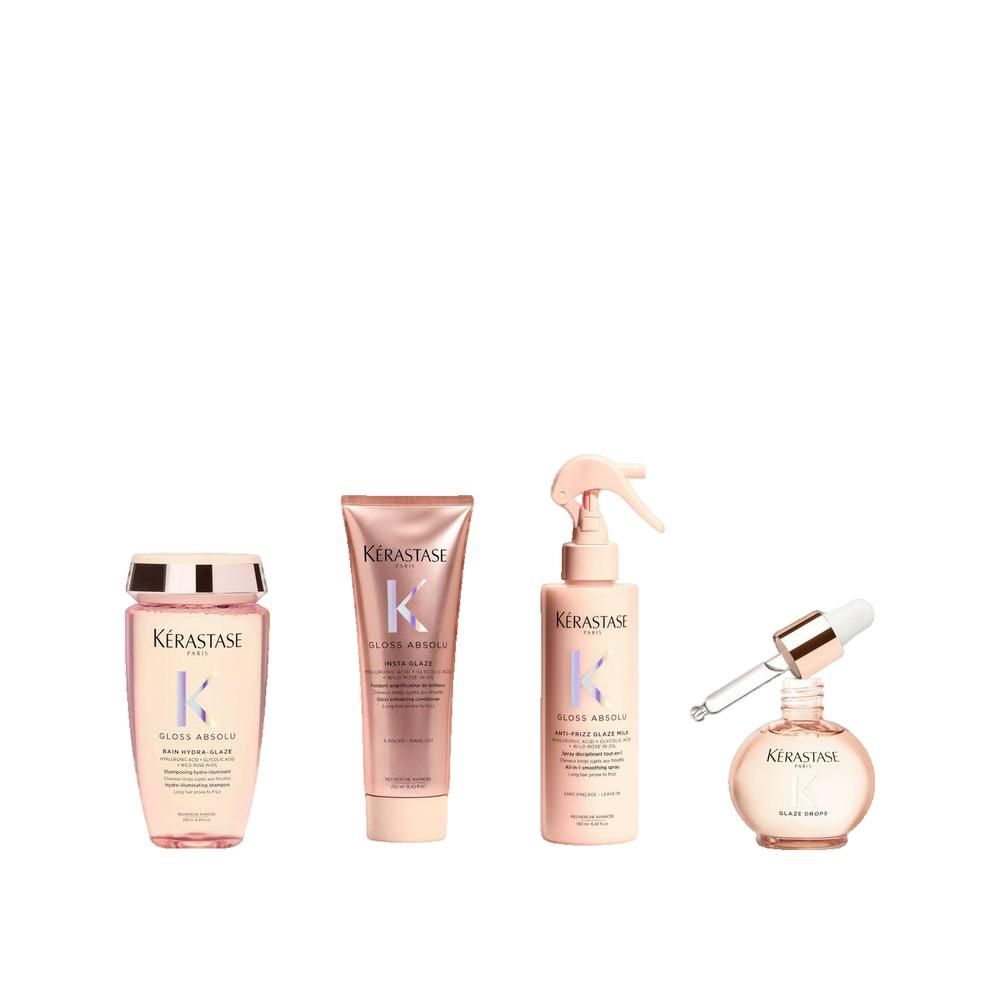 Vier Produkte: Shampoo, Spülung, Spray und Öl. Rosa Verpackung. Kérastase-Logo. Gloss Absolu-Produktlinie.