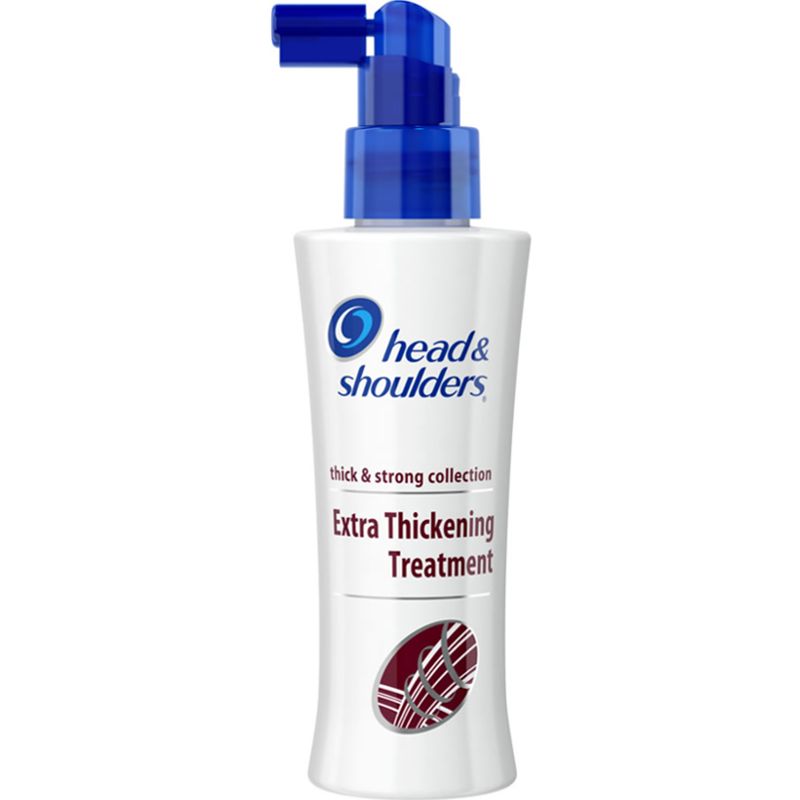 Nahaufnahme einer Flasche 'Head & Shoulders Extra Thickening Treatment' mit blauem Pumpspender.