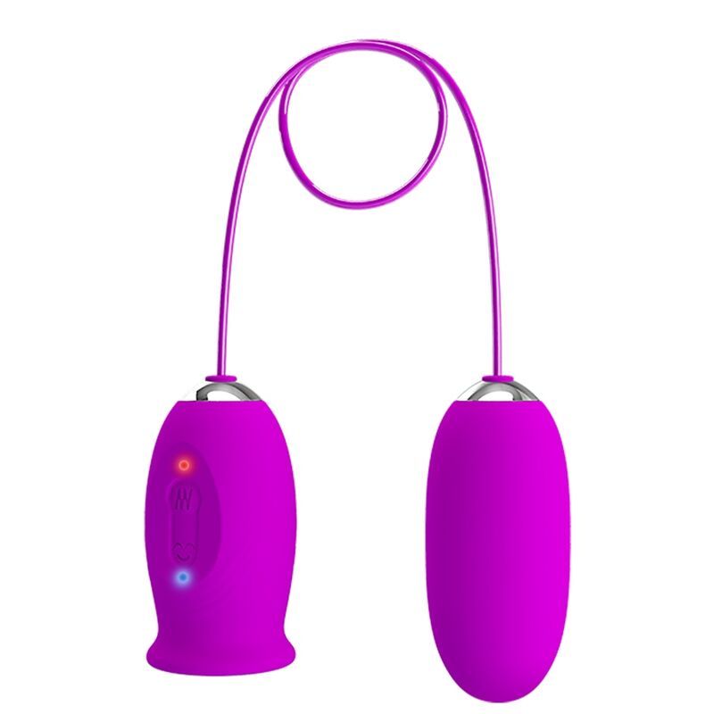 Zwei ovale, magenta-farbene Vibratoren, verbunden durch ein lila Kabel. Ein Vibrator hat Knöpfe und Lichter.