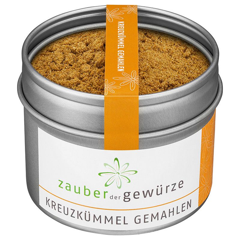 Runde Dose mit gemahlenem Kreuzkümmel. Orangefarbenes Etikett mit Produktnamen. Marke: Zauber der Gewürze.