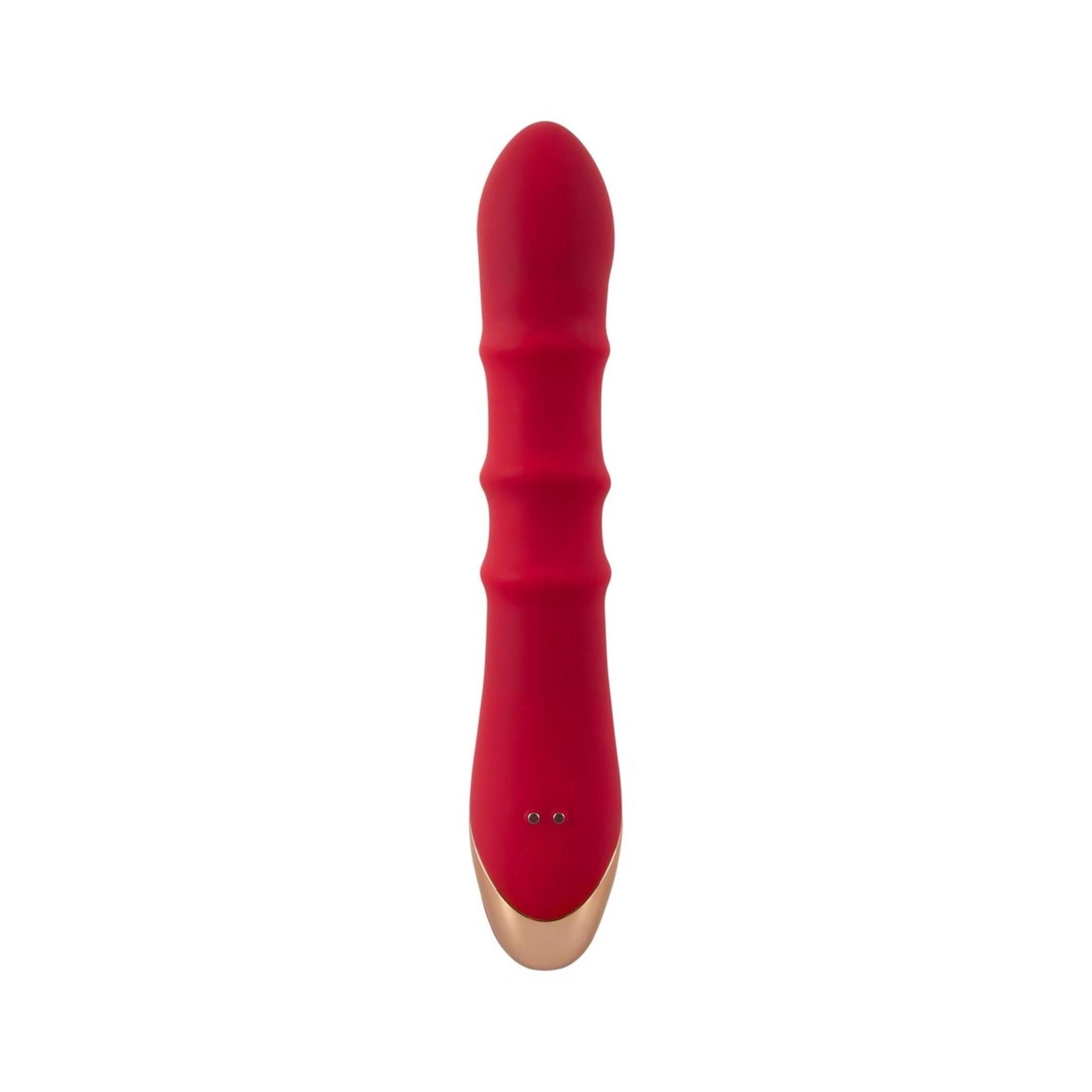 Roter Vibrator mit geriffelter Oberfläche und goldfarbenem Akzent. Vertikale Ansicht.