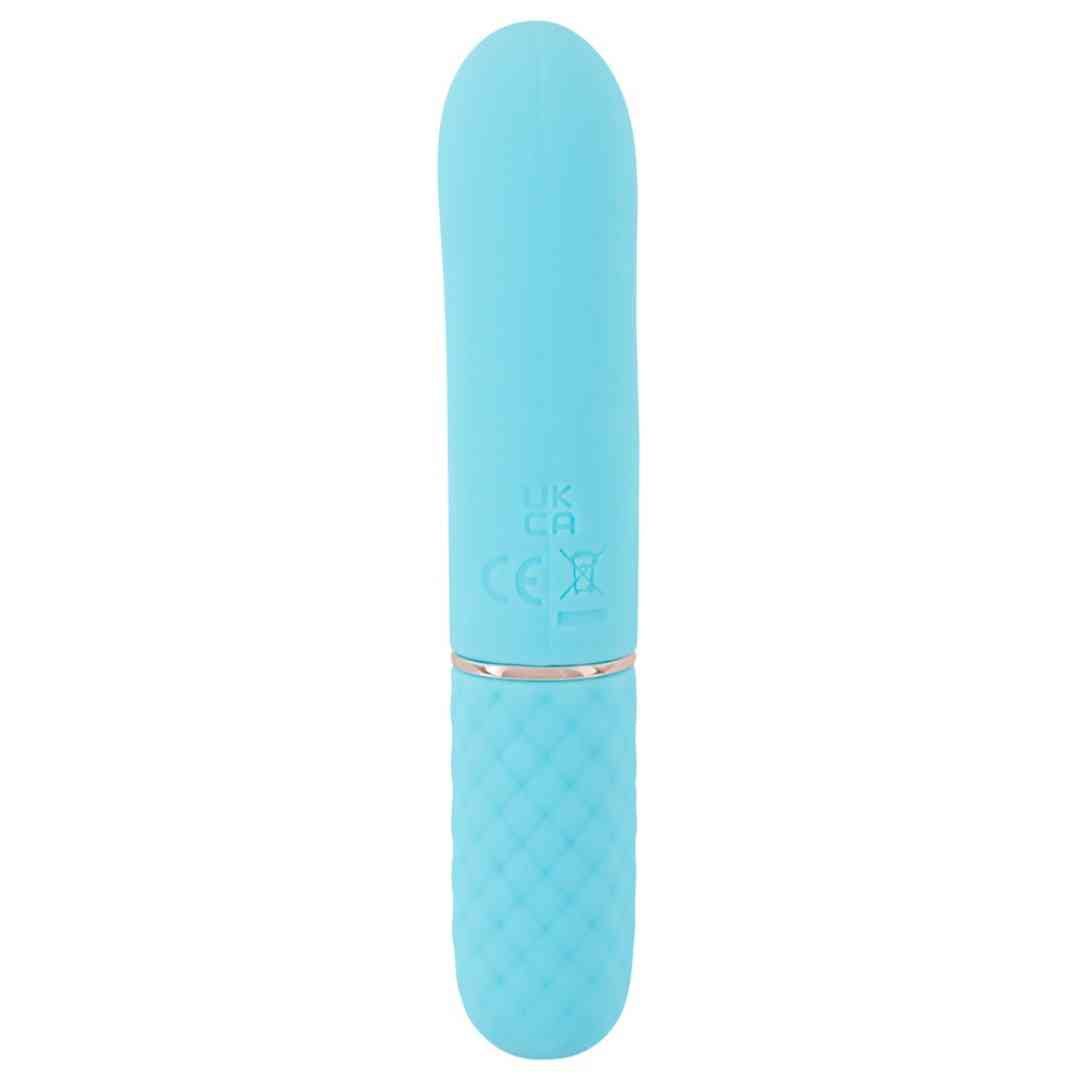 Türkisfarbener Vibrator. Unterteil mit Rautenmuster, goldfarbener Ring. CE-Kennzeichnung.