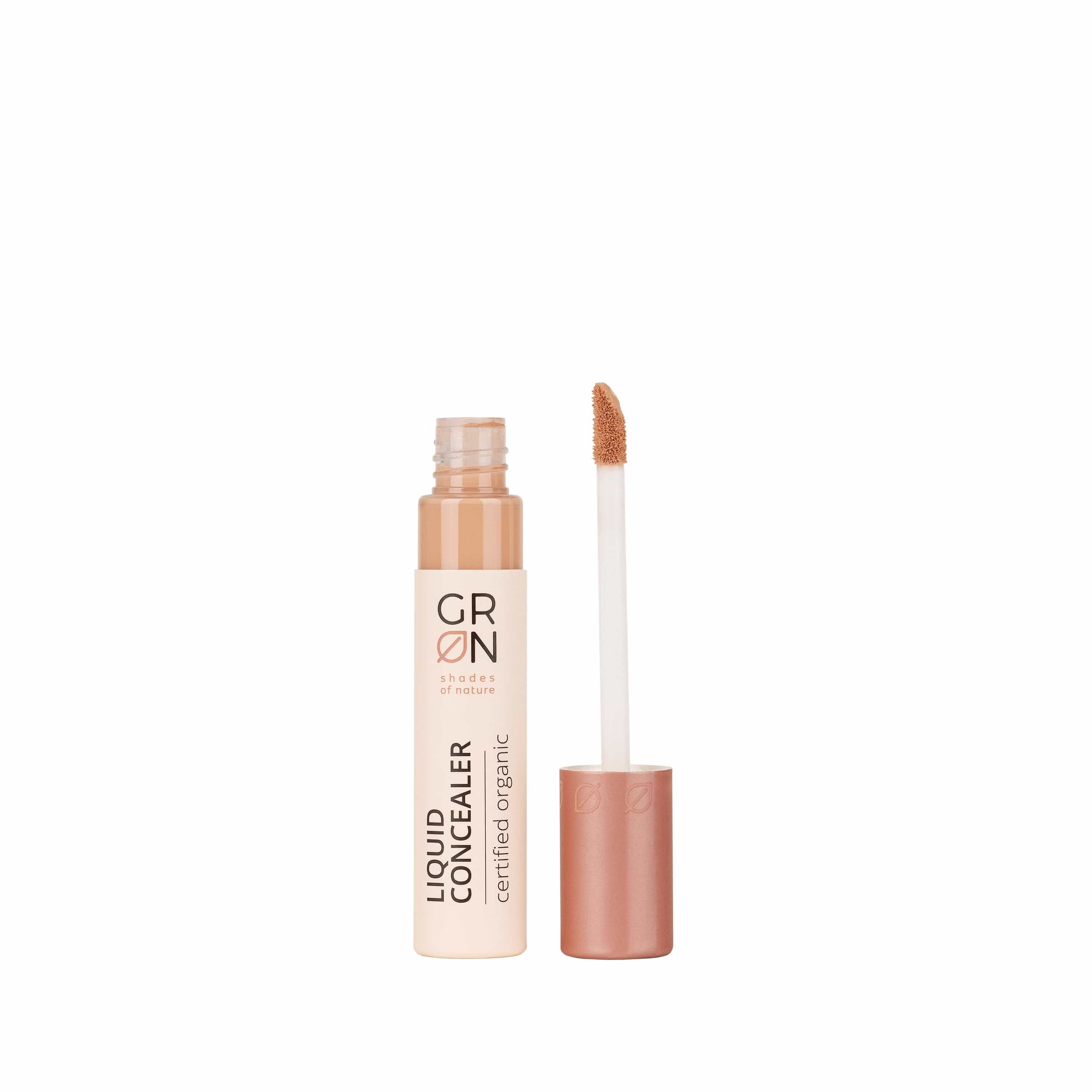 GRN Liquid Concealer beige oat. Flasche mit Applikator. Text: Liquid Concealer, certified organic. Deckel und Applikator in Rosé. Produkt steht.
