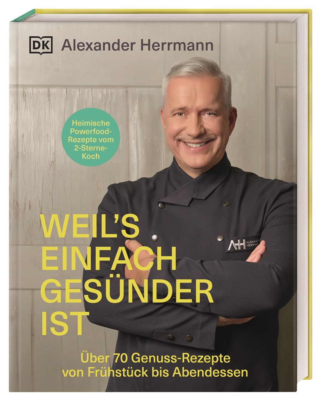 Buchcover mit Porträt von Alexander Herrmann. Titel: Weil's einfach gesünder ist. Grünes Siegel: Heimische Powerfood-Rezepte.