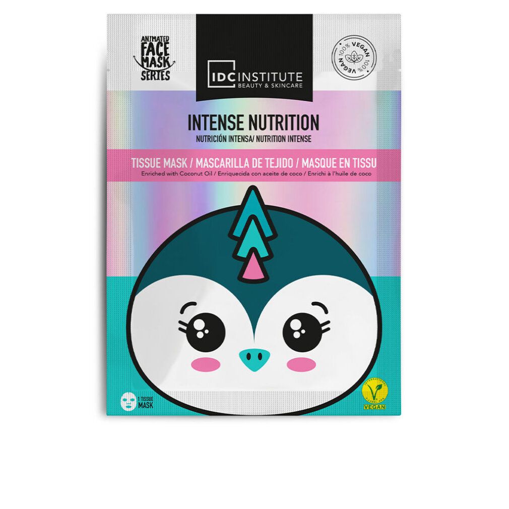 Pflegende Gesichtsmaske im Pinguin-Design. "Intense Nutrition" Aufschrift.