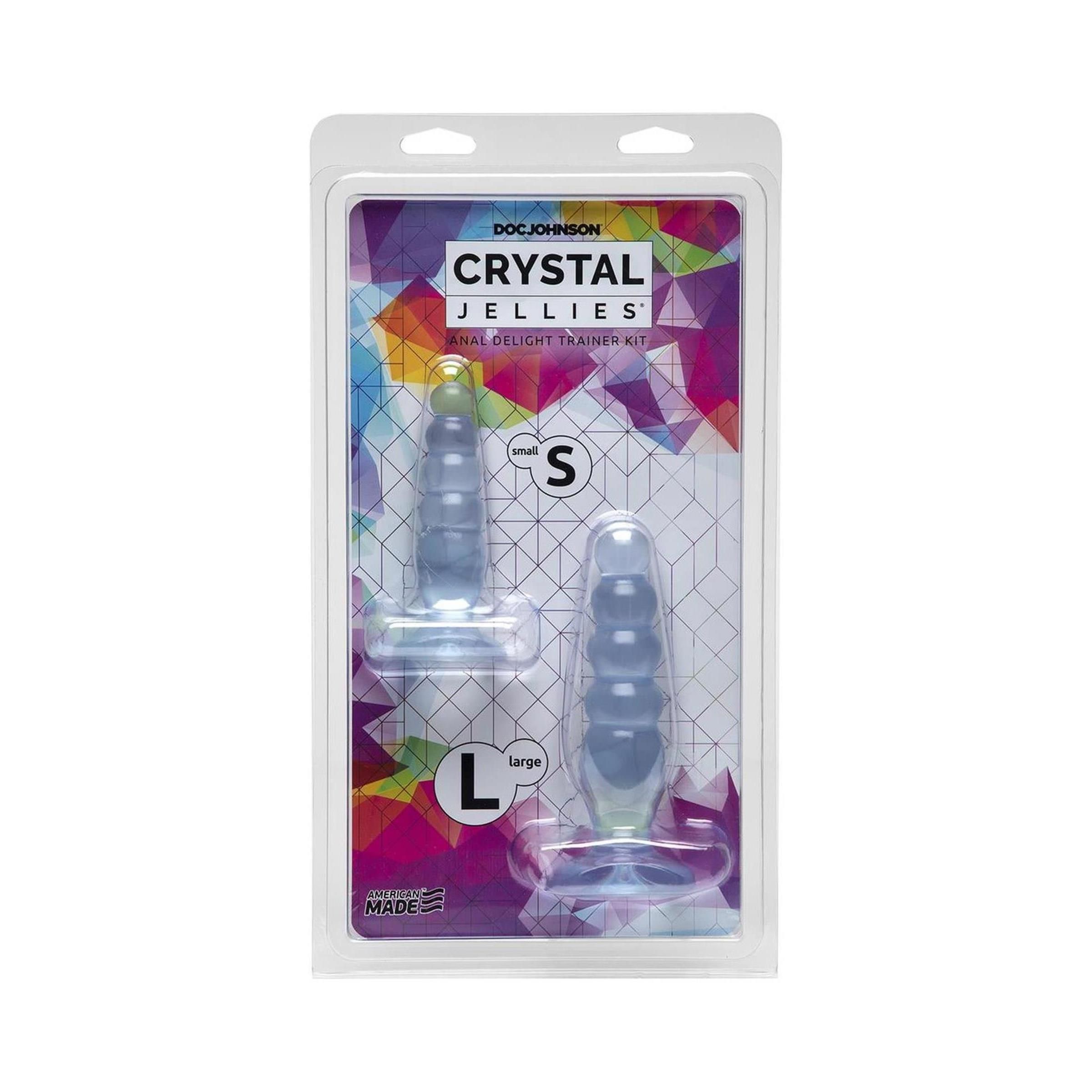 Zwei Anal-Trainer in Blisterverpackung. Klar, geriffelt, mit Basis. Beschriftung: "S" und "L". Marke: Doc Johnson, Crystal Jellies.