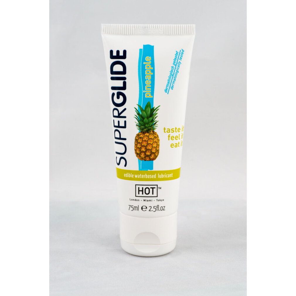 Weiße Tube mit SUPERGLIDE-Schriftzug, Ananas-Illustration und Text. Unten steht HOT und 75ml.