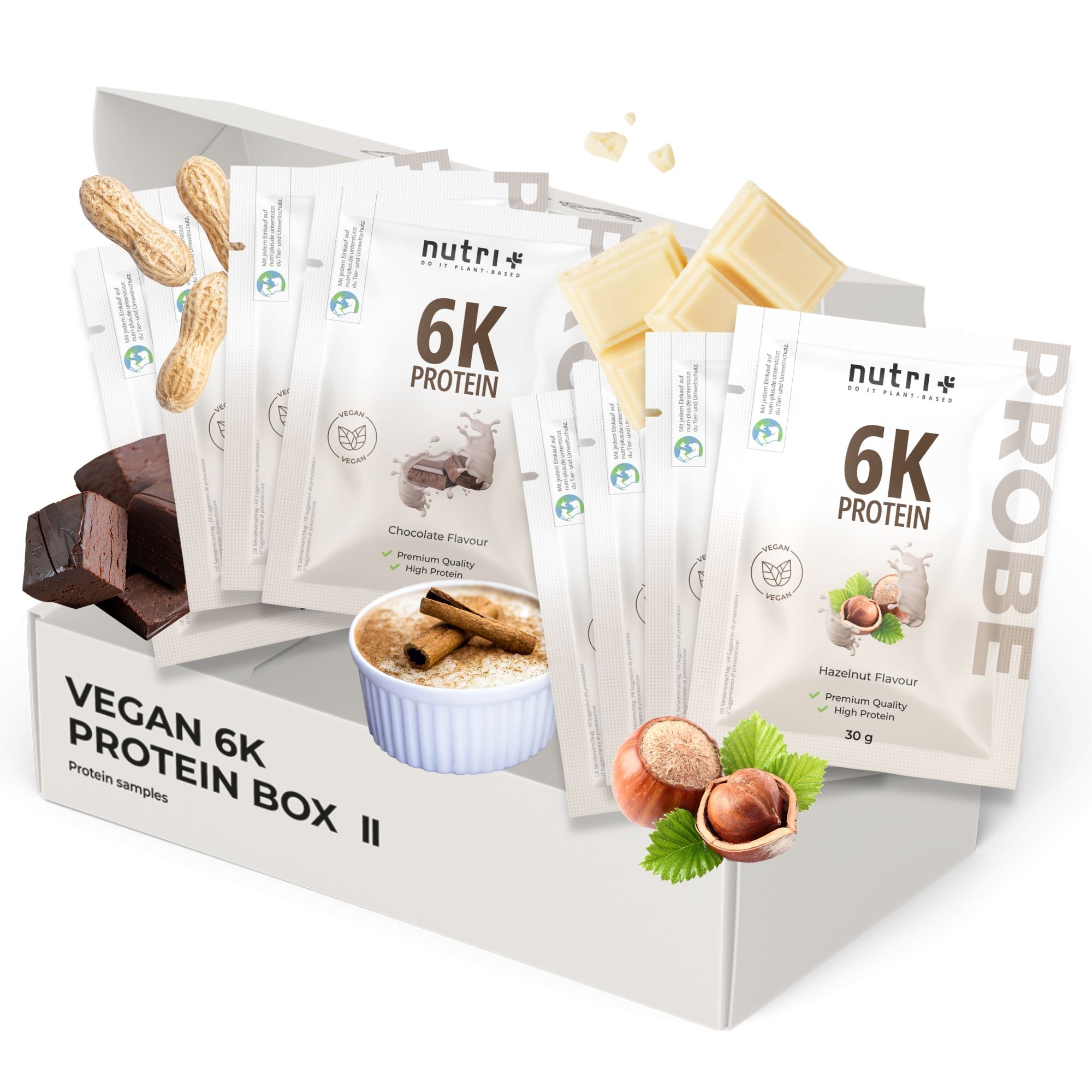 Box mit Protein-Proben. Enthält Beutel mit 6K Protein in verschiedenen Geschmacksrichtungen, Erdnüsse, Schokolade und weiße Schokolade.