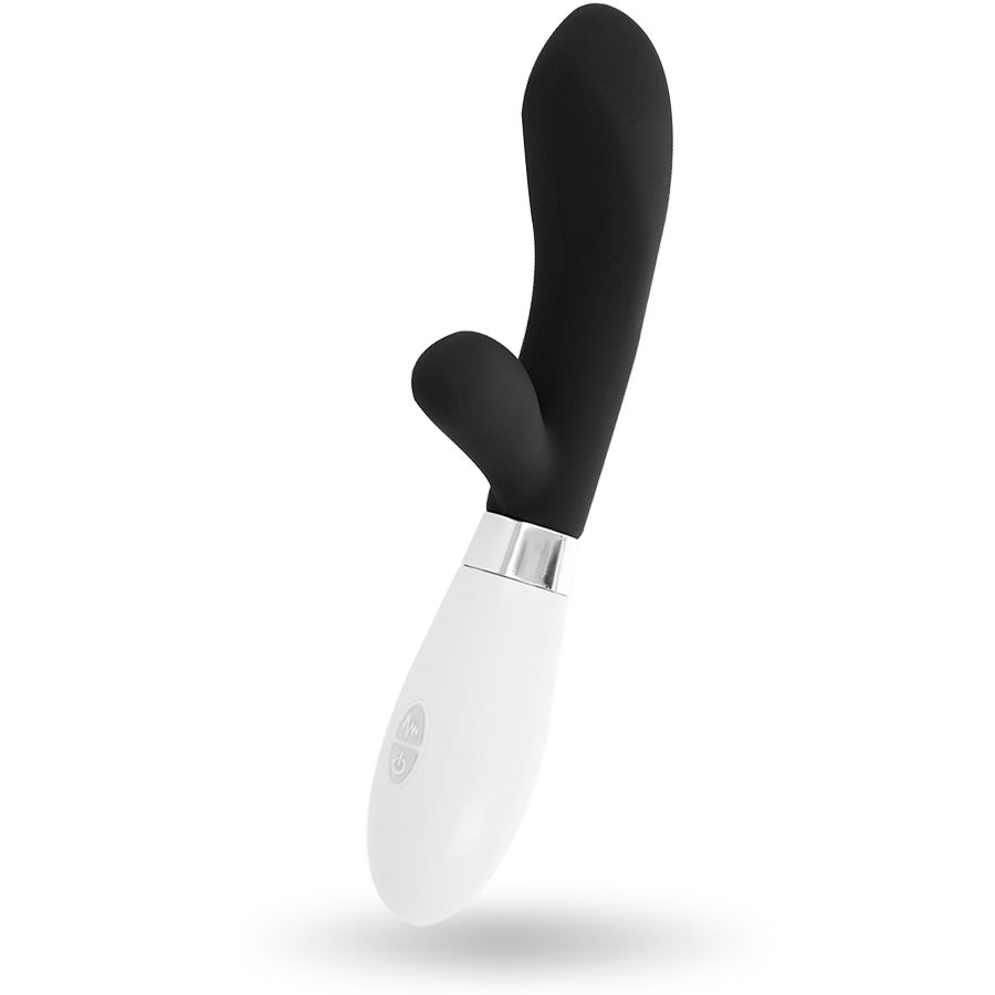 Schwarz-weißer Vibrator mit gebogener Form. Der obere Teil ist schwarz, der untere Teil weiß. Mit silberfarbenem Ring.