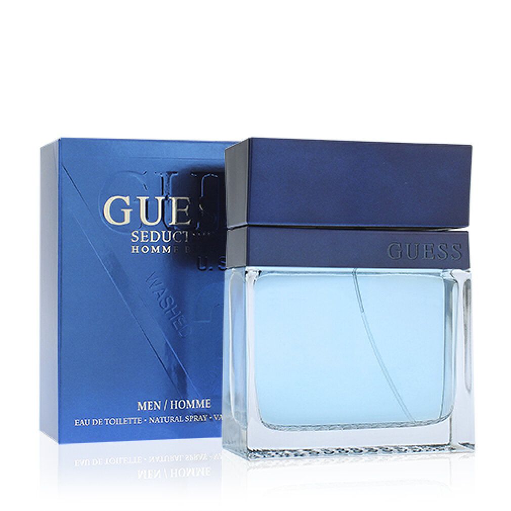 Blaues Parfümflakon und -verpackung. Auf der Verpackung steht "GUESS Seductive Homme Blue". Flakon mit blauem Deckel und hellblauer Flüssigkeit.