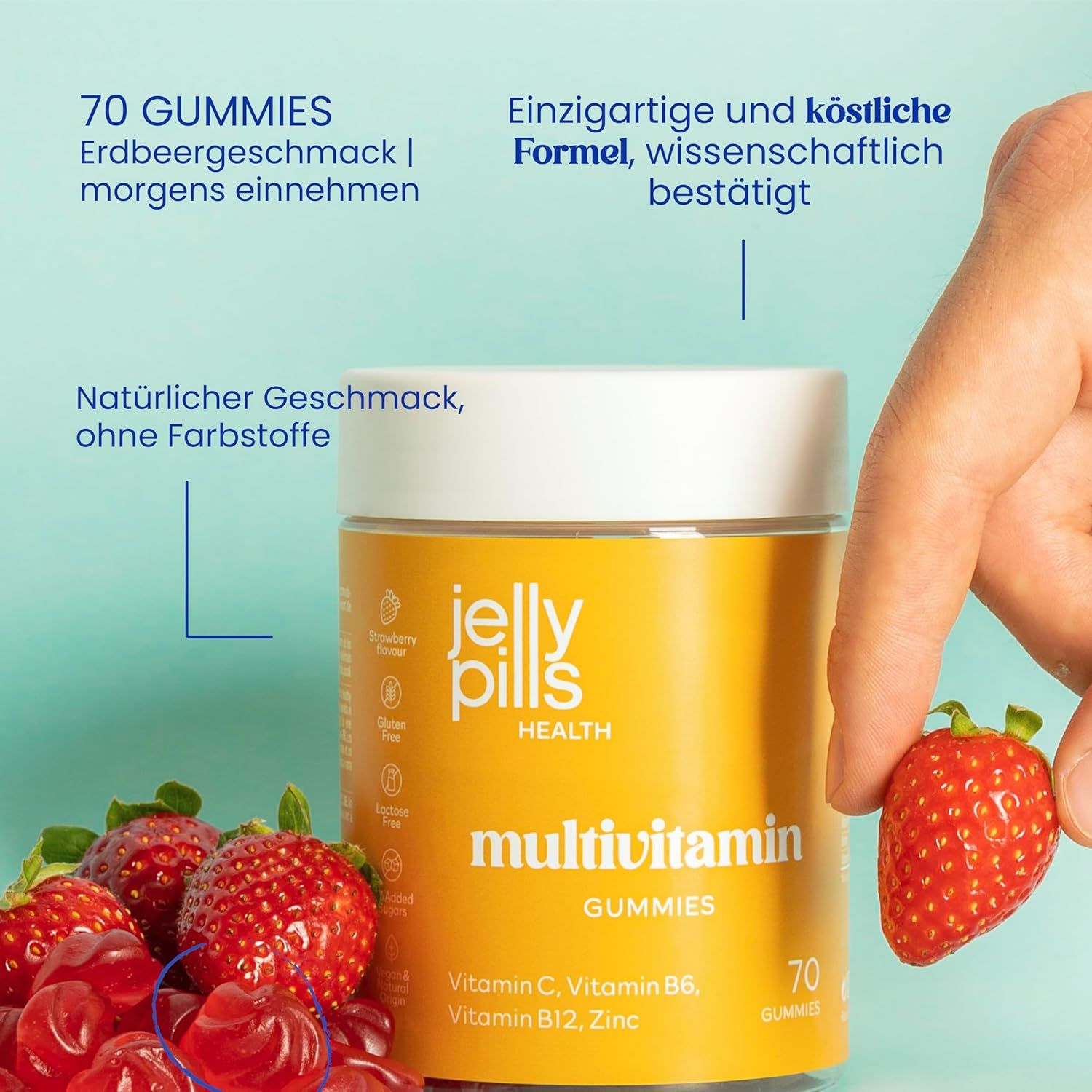 Person hält eine Erdbeere neben einer Dose Jelly Pills Multivitamin Gummies. 70 Gummies. Erdbeergeschmack. Rote Gummibärchen.