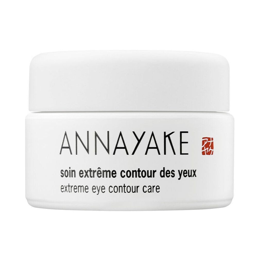 Weißer Tiegel mit Deckel. Aufschrift: ANNAYAKE, soin extrême contour des yeux, extreme eye contour care. Rotes Logo.