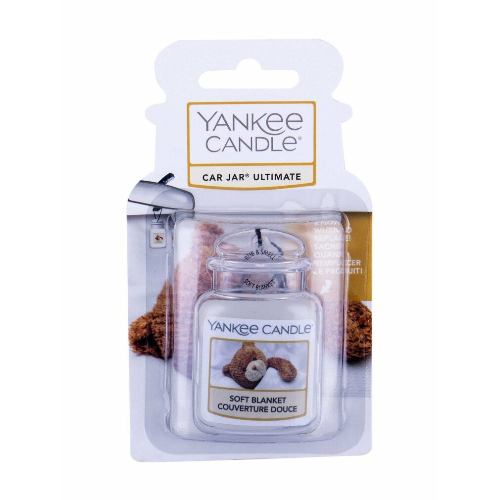 Lufterfrischer im Glasbehälter mit Deckel, in Blisterverpackung. Aufschrift: Soft Blanket. Marke: Yankee Candle.