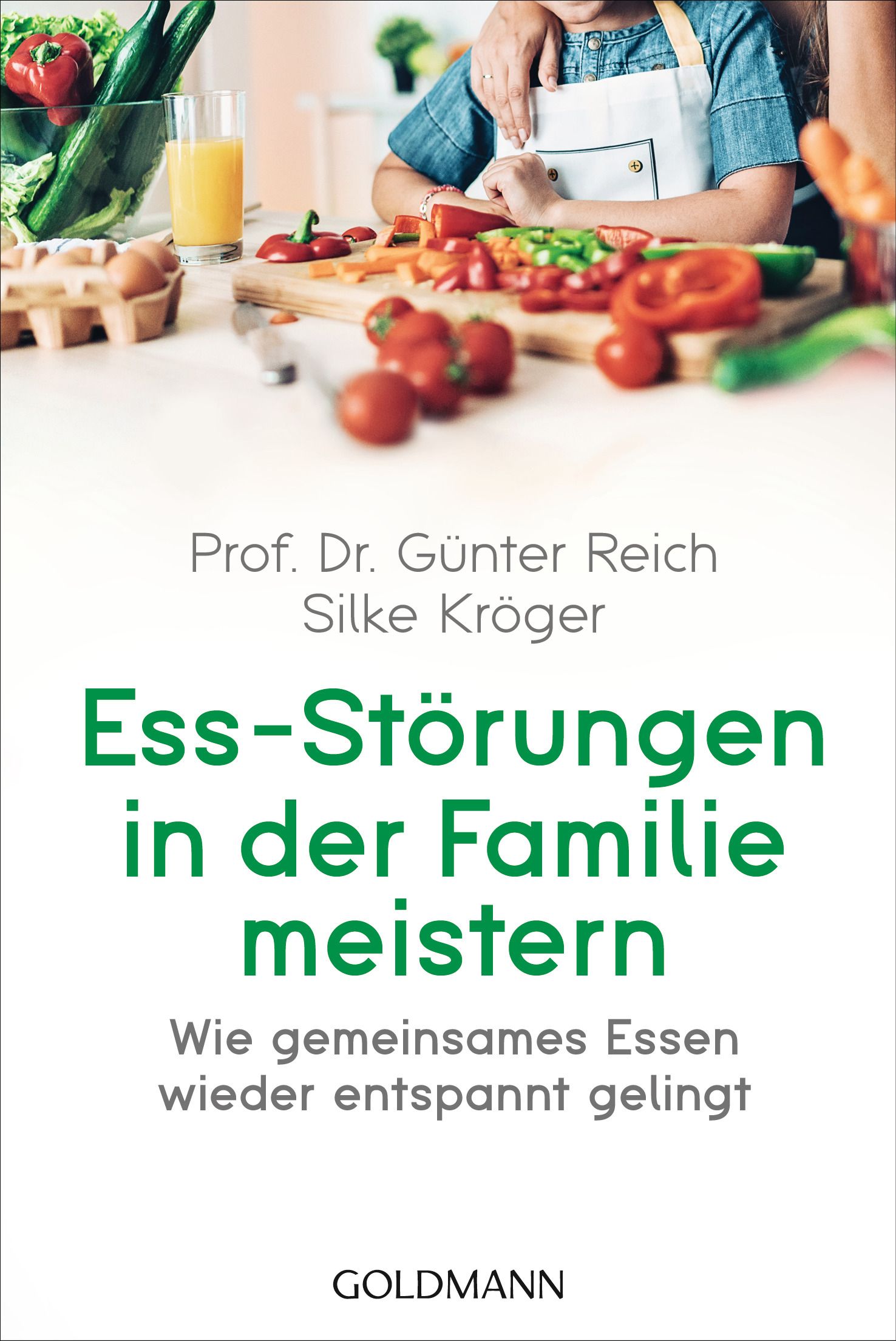 Buchcover mit Titel: Ess-Störungen in der Familie meistern. Autoren: Prof. Dr. Günter Reich, Silke Kröger. Verlag: GOLDMANN. Im Hintergrund: Zutaten.