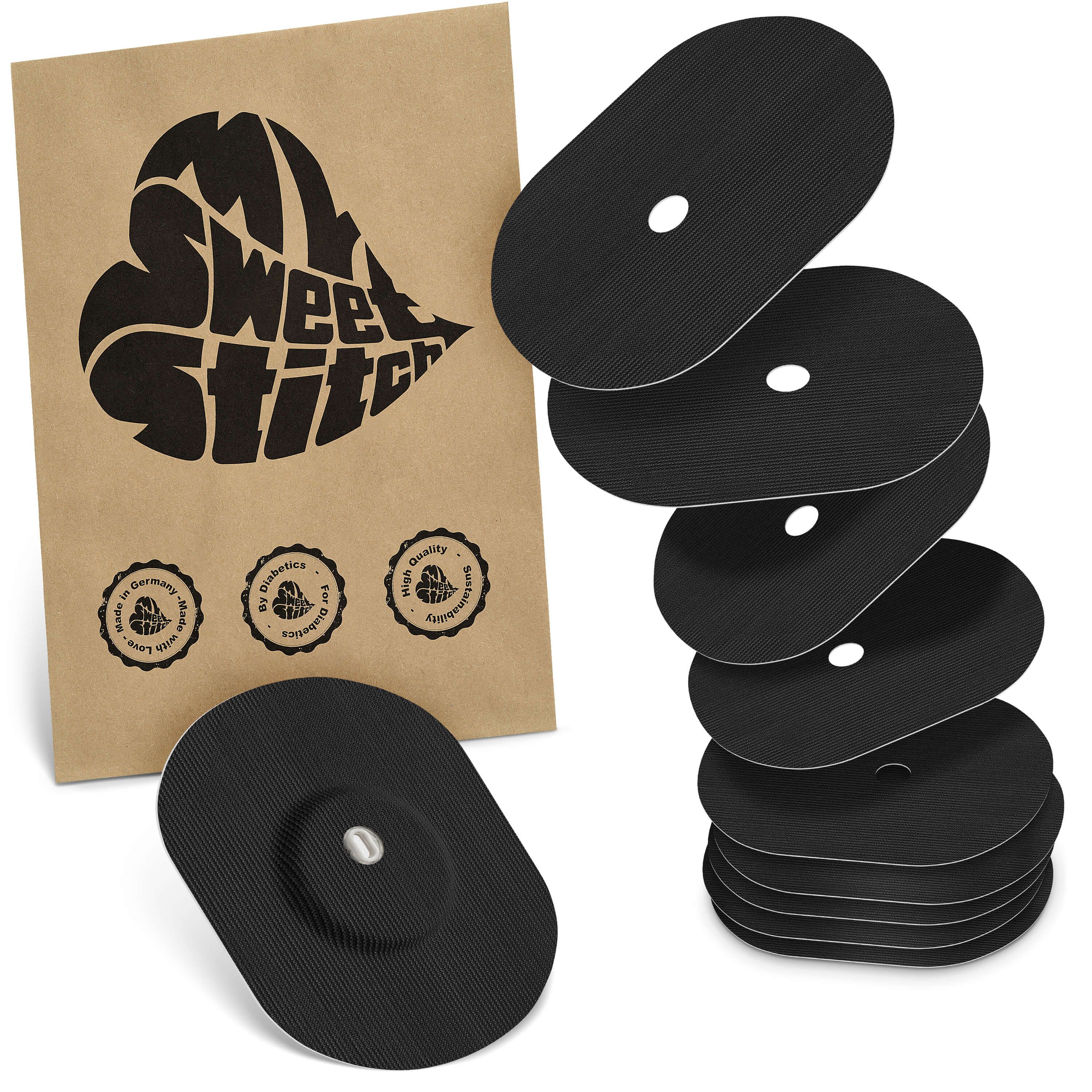 Schwarze, ovale Pflaster mit Loch. Verpackung mit Logo und Siegeln. Ein Pflaster mit Sensor. Mehrere Pflaster gestapelt.