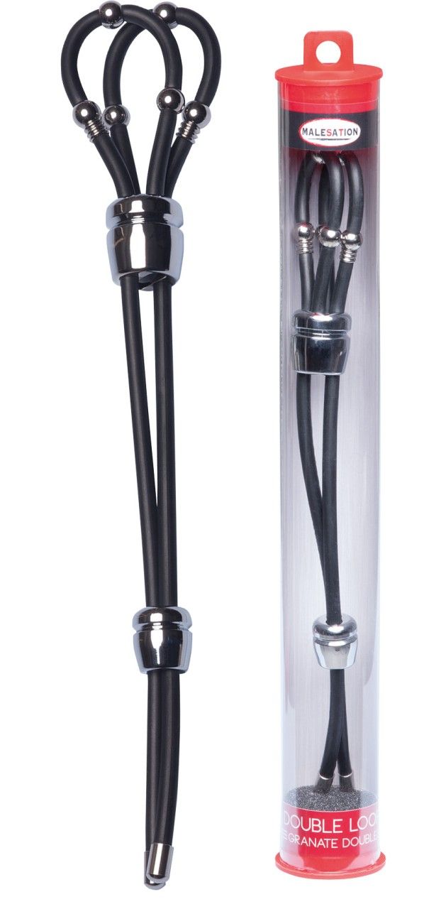 Schwarzes Wellness-Produkt mit doppelter Schlaufe und Kugeln. In transparenter Verpackung mit rotem Deckel. Produktname sichtbar.