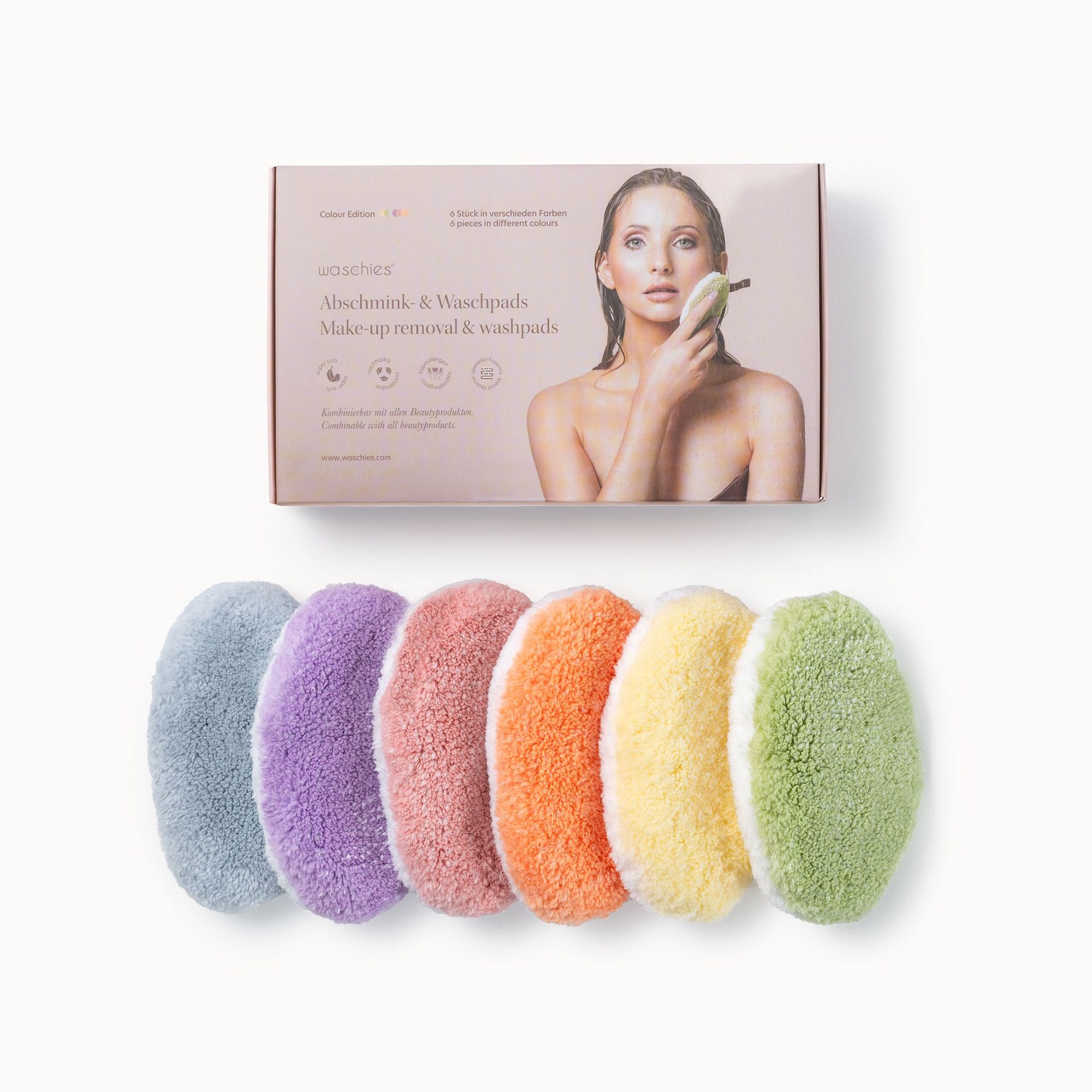 Verpackung mit Abschminkpads. Sechs farbige Pads liegen daneben. Aufdruck: Make-up removal & washpads.