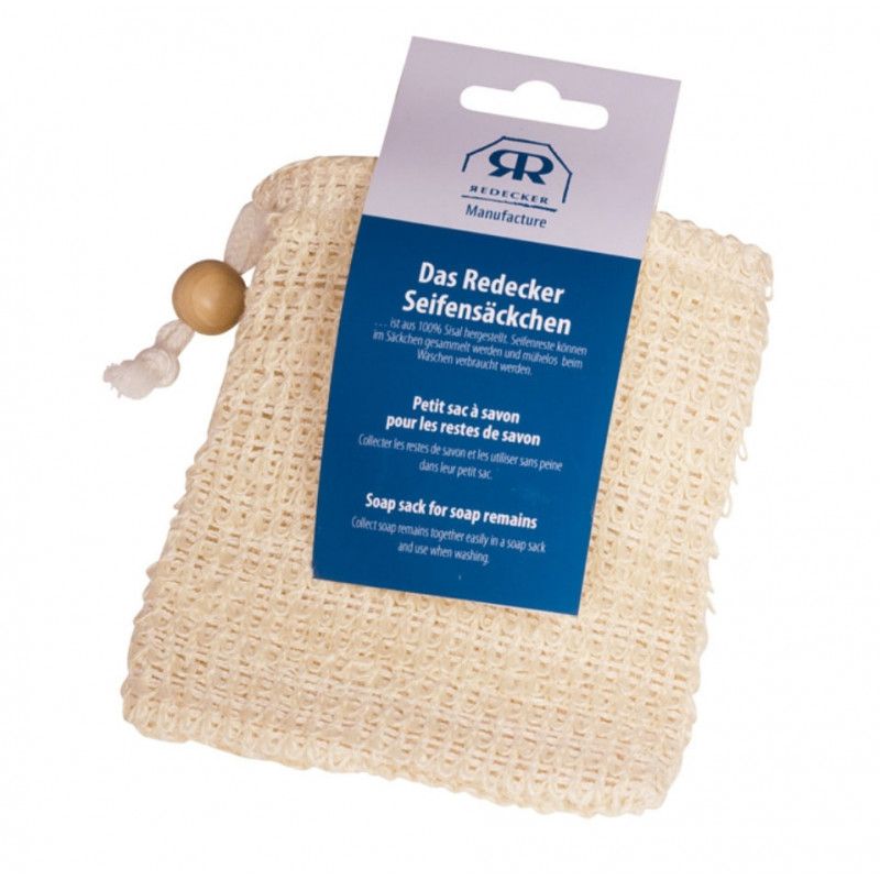 Sisal Seifensäckchen mit Holzperle und Anhänger. Anhänger mit Logo und Produktbezeichnung. Text: "Das Redecker Seifensäckchen".