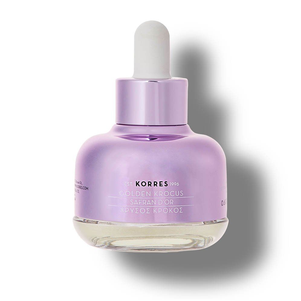 Flasche mit Pipette. Fliederfarbenes Glas, silberfarbener Deckel. Beschriftung: KORRES, Golden Krocus, Saffron, Augen-Elixier.