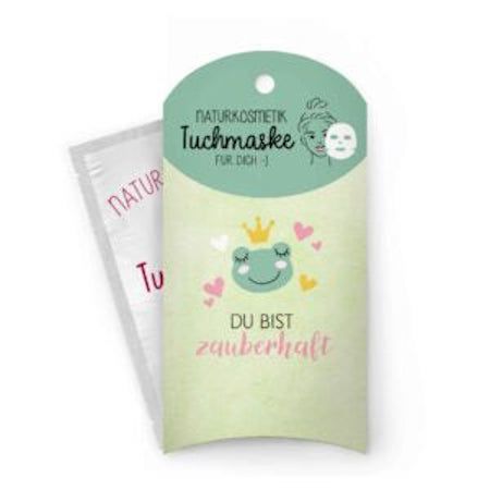 Verpakking gezichtsmasker met kikkerillustratie en tekst. Daarnaast een enkel masker in folieverpakking.