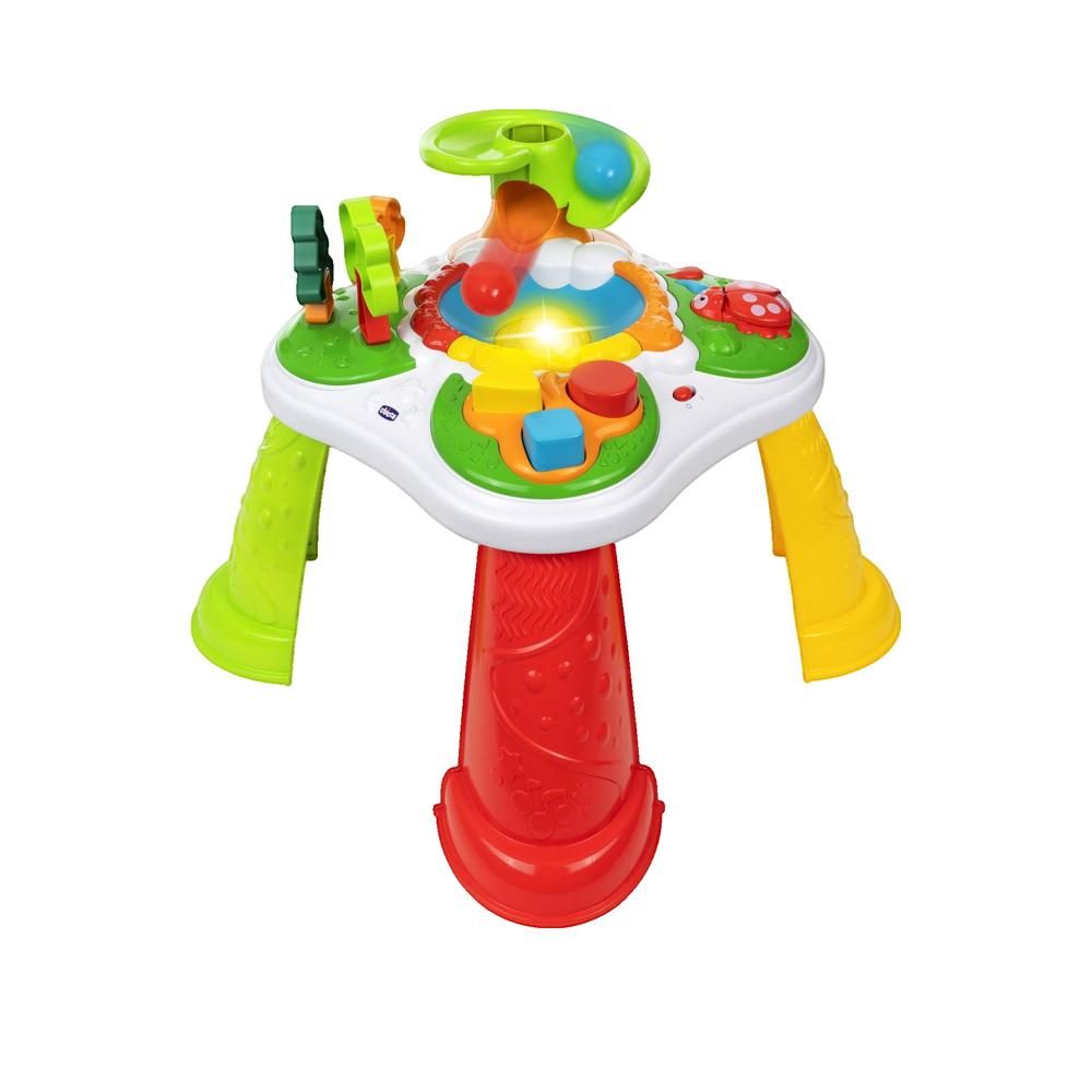 Buntes Spielzeug für Kinder. Tischförmig mit Beinen. Oben mit verschiedenen Elementen: Knöpfe, Räder, Figuren.