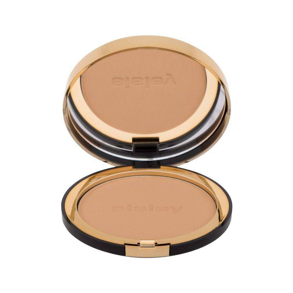 Kompaktpuder mit geöffnetem Deckel. Goldfarbener Deckel, schwarzer Rand. Aufschrift Sisley.