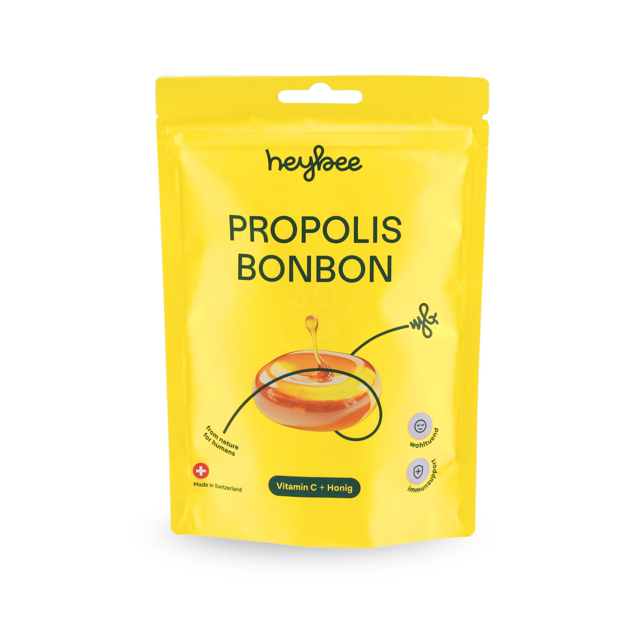 Gelbe Verpackung Heybee Propolis Bonbon. Text: Propolis Bonbon, Vitamin C + Honig. Hergestellt in der Schweiz.