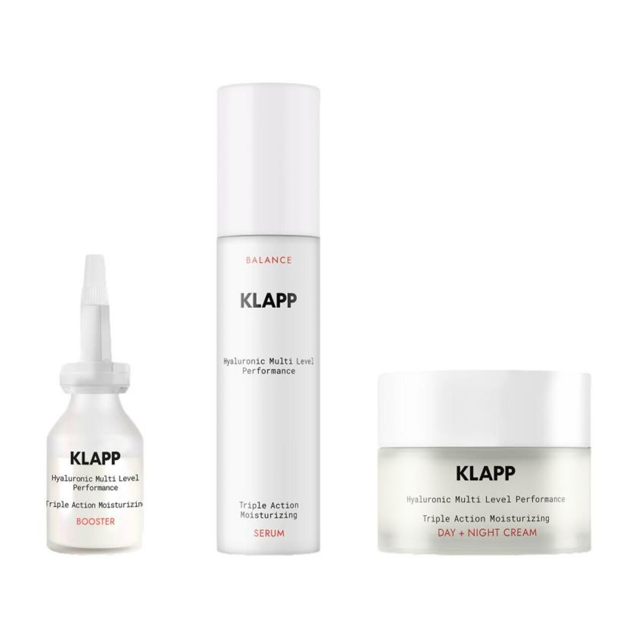 Drei weiße Flakons: Booster, Serum und Tages-/Nachtcreme. Aufschrift: KLAPP, Hyaluronic Multi Level Performance, Triple Action Moisturizing.