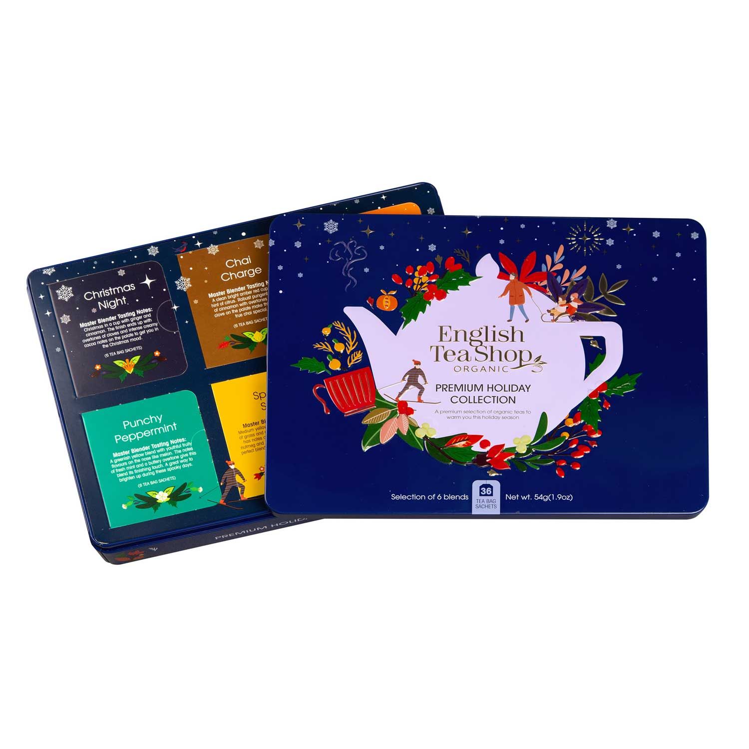 Blaue Metalldose mit Deckel. Aufdruck: Teekanne, Schriftzug "English Tea Shop Organic", "Premium Holiday Collection". Geöffnete Dose mit Teebeuteln.